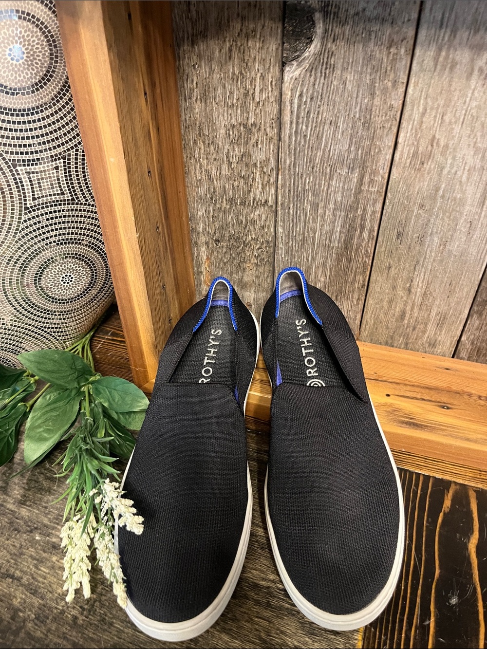 Rothy's Women’s Black Slip-On Loafers with Blue Trim